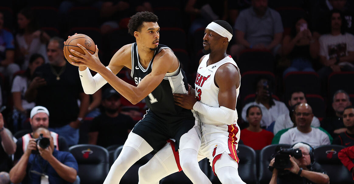 开云体育官方网站-NBA季后赛：热火队险胜人队晋级下一轮的简单介绍